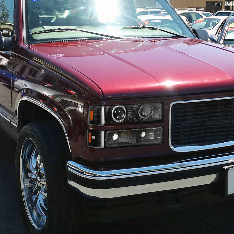 1994-1999 GMC C/K C10 Sierra Dual Halo Projector Headlights With Bumper and Corner Signal Lights (Matte Black Housing/Clear Lens)
