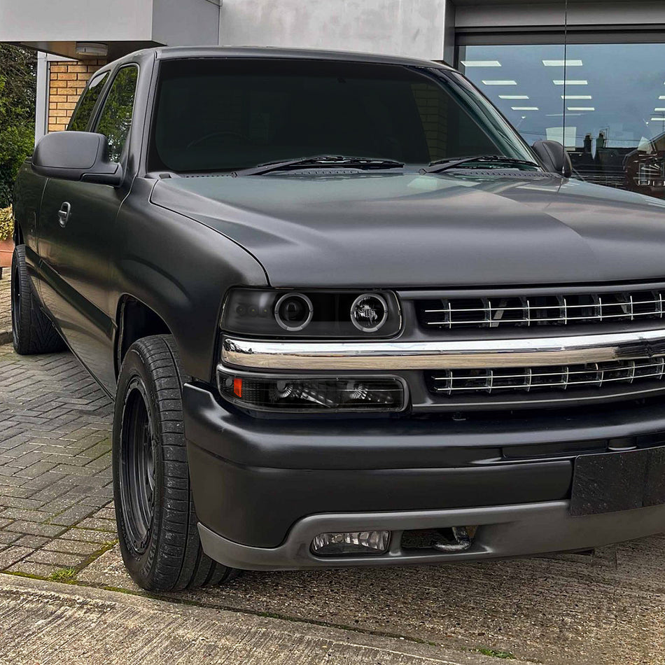 1999-2002 Chevrolet Silverado/ 2000-2006 Tahoe Suburban Dual Halo Projector Headlights w/ Bumper Lights (Matte Black Housing/Clear Lens)