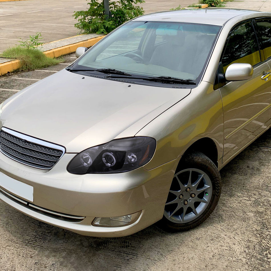 2003-2008 Toyota Corolla Dual Halo Projector Headlights (Glossy Black Housing/Smoked Lens)