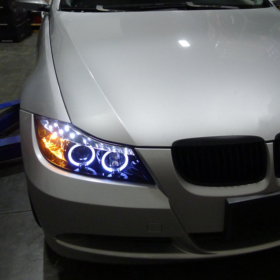 2006-2008 BMW E90 3 Series Sedan Dual Halo Projector Headlights w/ LED Light Strip (Glossy Black Housing/Smoked Lens)