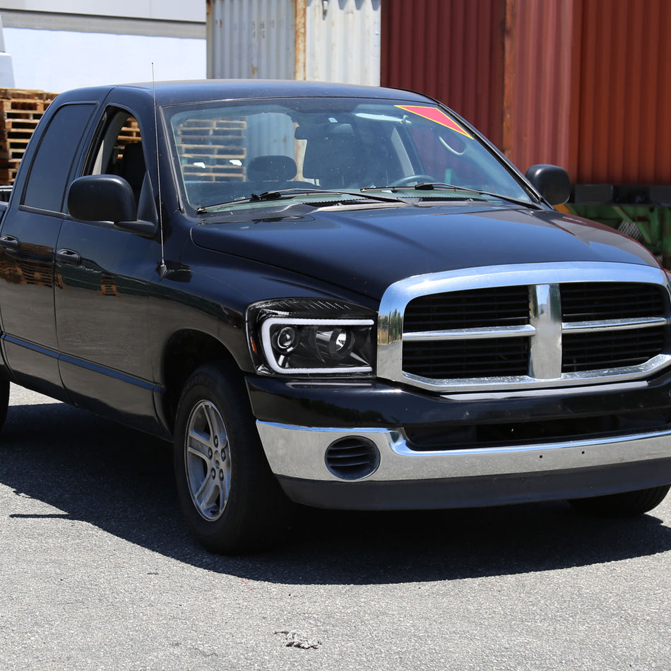 2006-2008 Dodge RAM 1500/ 2006-2009 2500 3500 Switchback LED C-Bar Projector Headlights (Jet Black Housing/Clear Lens)