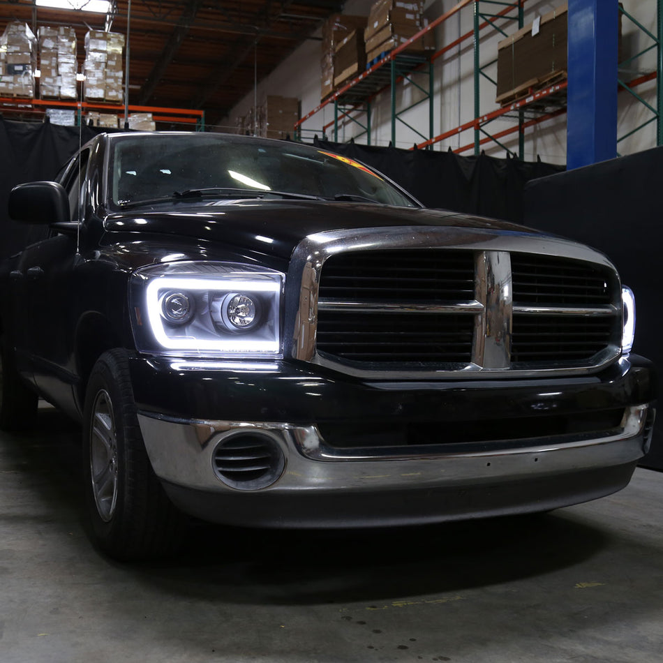 2006-2008 Dodge RAM 1500/ 2006-2009 2500 3500 Switchback LED C-Bar Projector Headlights (Matte Black Housing/Clear Lens)