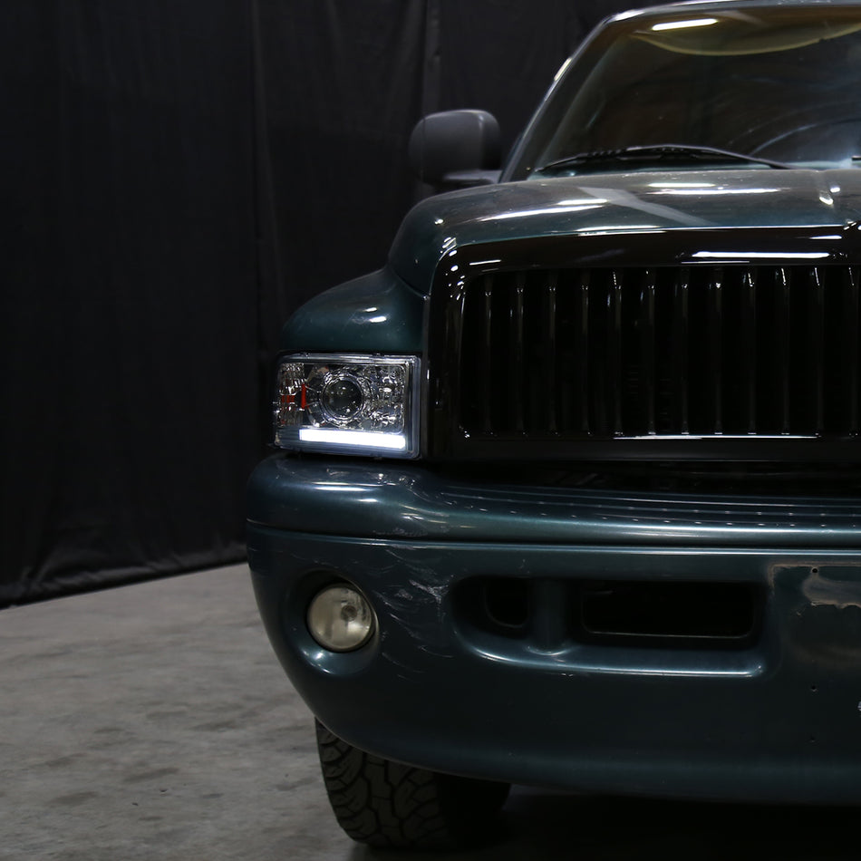 1994-2001 Dodge RAM 1500/ 1994-2002 RAM 2500 3500 Projector Headlights w/ SMD LED Light Strip (Chrome Housing/Clear Lens)