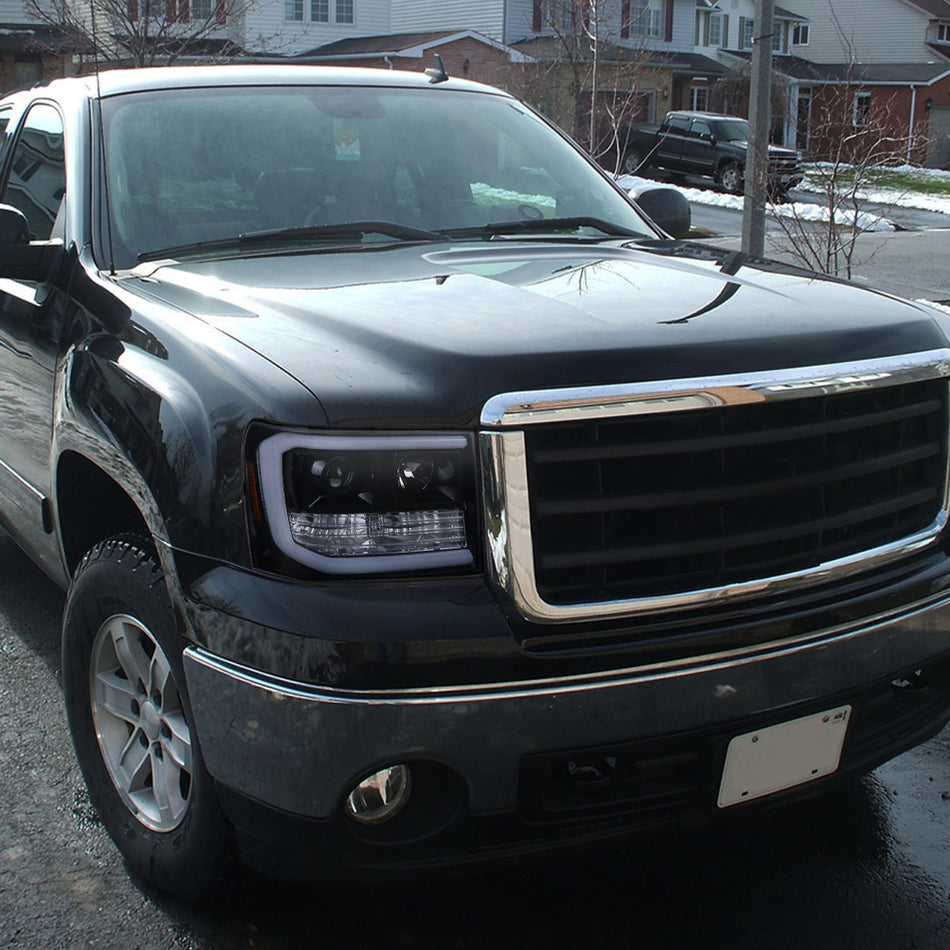 2007-2013 GMC Sierra 1500 / 2007-2014 Sierra 1500HD 2500HD 3500HD / 2009-2013 Sierra 1500 Hybrid LED C-Bar Projector Headlights (Glossy Black Housing/Smoked Lens)