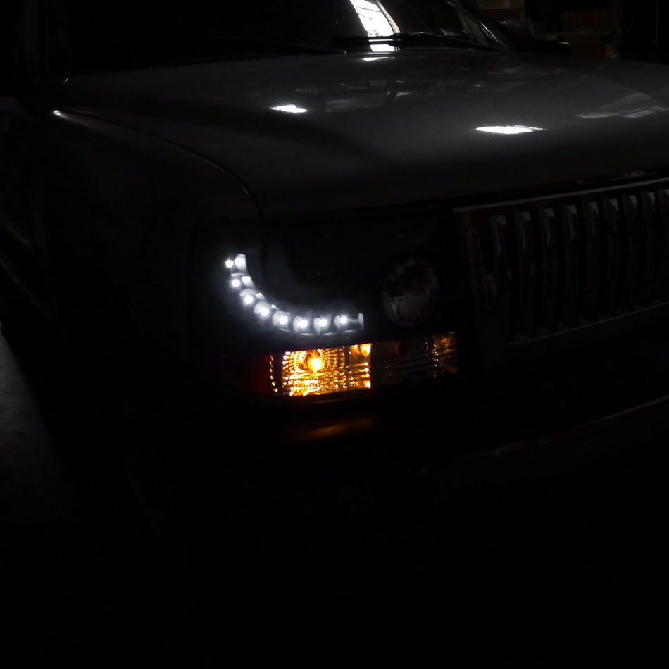 1999-2002 Chevrolet Silverado 1PC Projector Headlights w/ LED Light Strip & Bumper Lights (Black Housing/Smoked Lens)