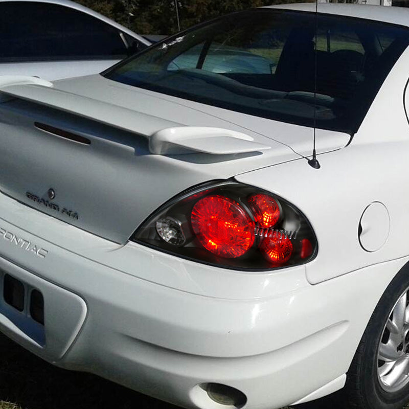1999-2005 Pontiac Grand AM Tail Lights (Matte Black Housing/Clear Lens)