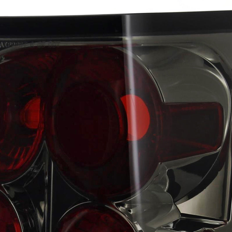 2005-2006 Jeep Grand Cherokee Tail Lights (Chrome Housing/Smoked Lens)