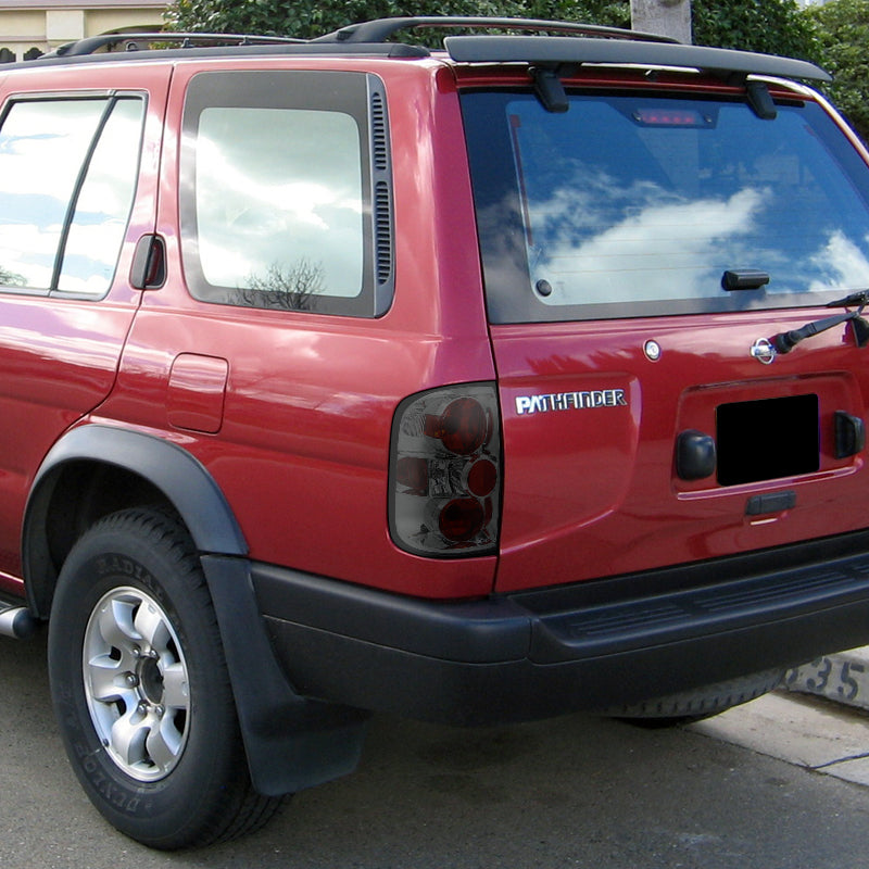 1996-2004 Nisssan Pathfinder/ Infiniti QX4 Tail Lights (Chrome Housing/Smoke Lens)