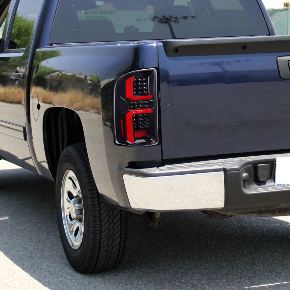 2007-2013 Chevrolet Silverado 1500/ 2007-2014 Silverado 2500HD/3500HD LED Tail Lights with Red LED Bar (Jet Black Housing/Clear Lens)