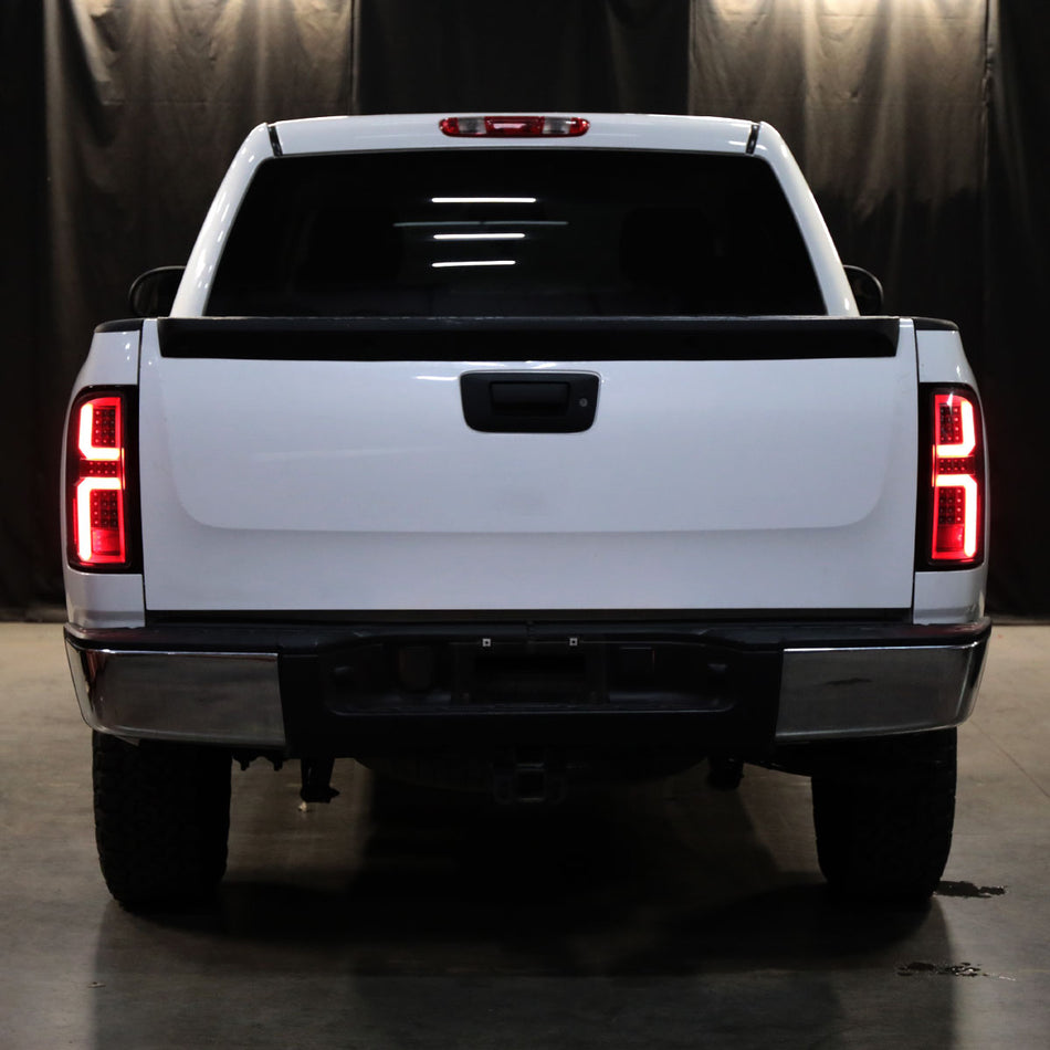 2007-2013 Chevrolet Silverado 1500/ 2007-2014 Silverado 2500HD/3500HD LED Tail Lights with White LED Bar (Matte Black Housing/Clear Lens)